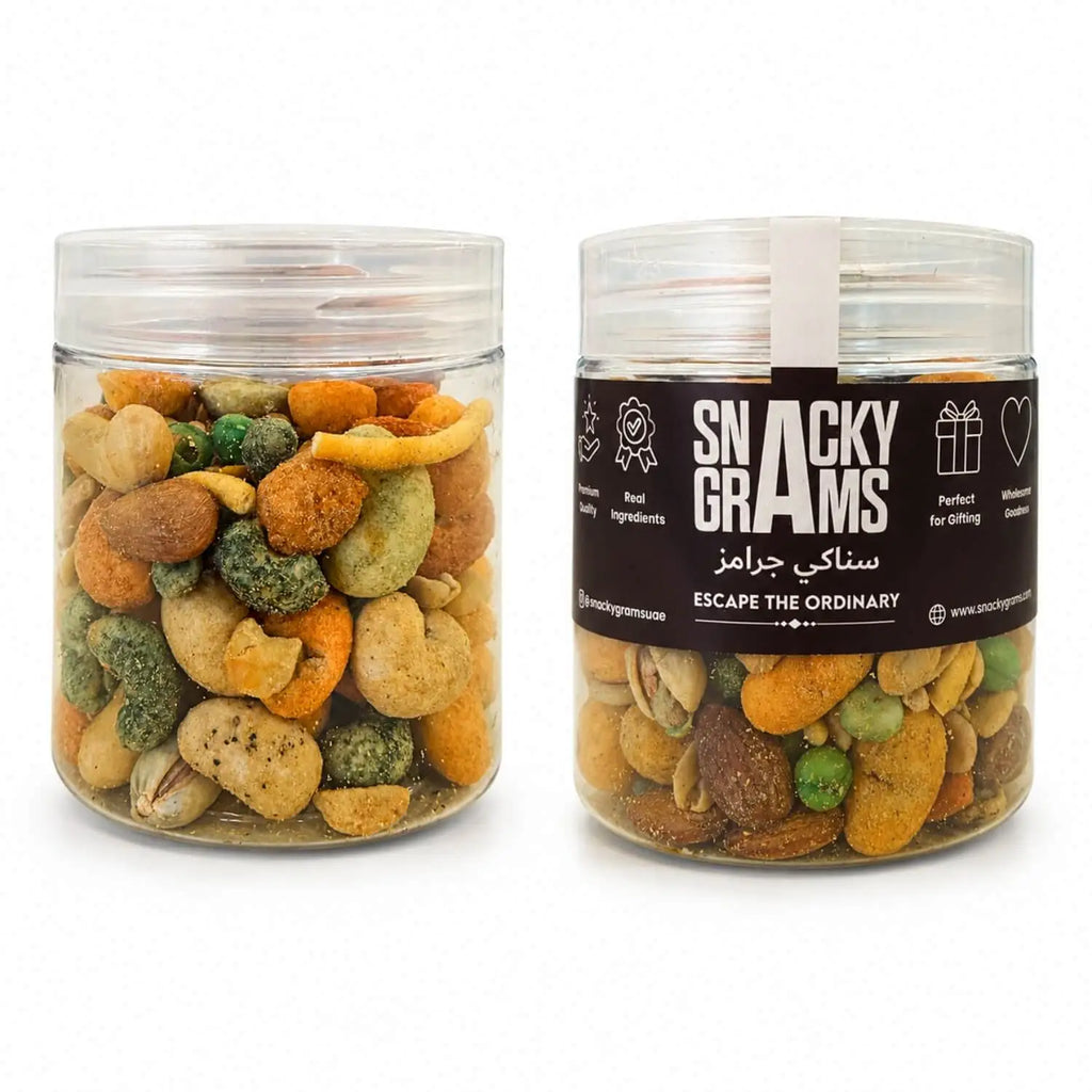 Two jars of mixed kri kri nuts with 'Snacky Grams' label 