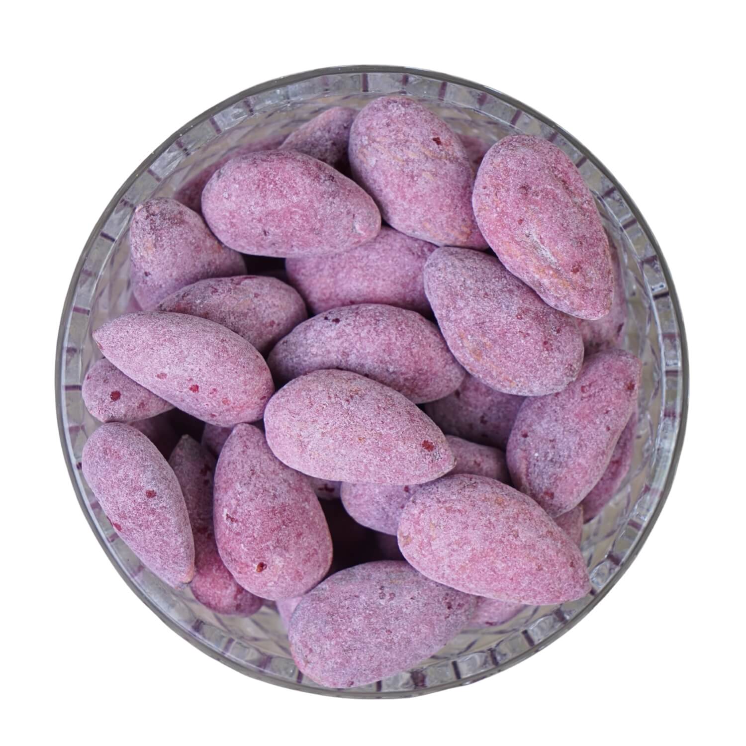 Purple almonds in a glass bowl on a white background