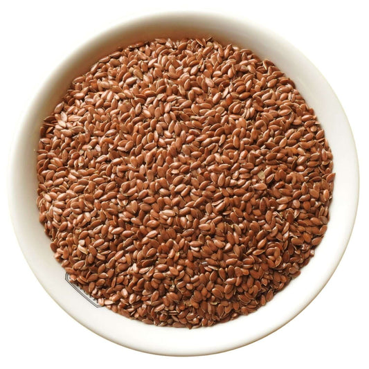 Premium Flax Seeds in white bowl
