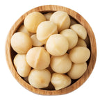Wooden bowl filled with macadamia nuts