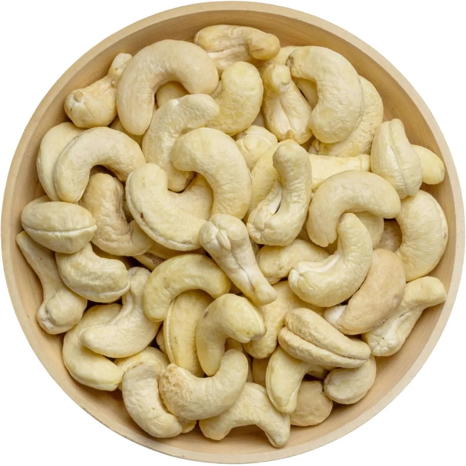 Wooden bowl filled with raw cashew nuts