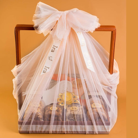 Gift basket with tea bags inside, wrapped in a sheer white ribbon Diwali Ramadan& Christmas gift box