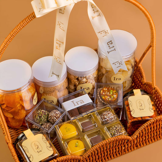 Basket of assorted jars and small boxes with 'Ira' Diwali Ramadan& Christmas gift box