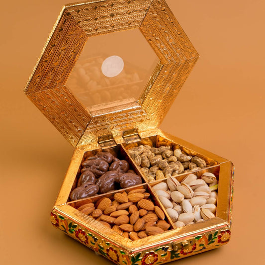 Decorative gold box with compartments filled with various nuts Diwali Ramadan& Christmas gift box
