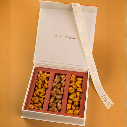 Open box with three compartments containing different types of nuts Diwali Ramadan& Christmas gift box