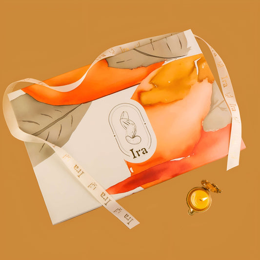 Silk scarf with 'Ira' branding on a brown Diwali Ramadan& Christmas gift box