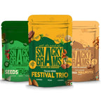 Three packages of Snacky Grams snacks on a white background