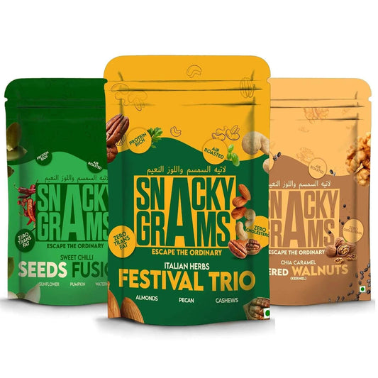 Three packages of Snacky Grams snacks on a white background