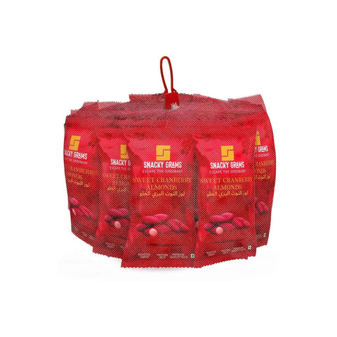 Red mesh bag with multiple Snacky Grams sweet cranberry lemon snack packages on a white background