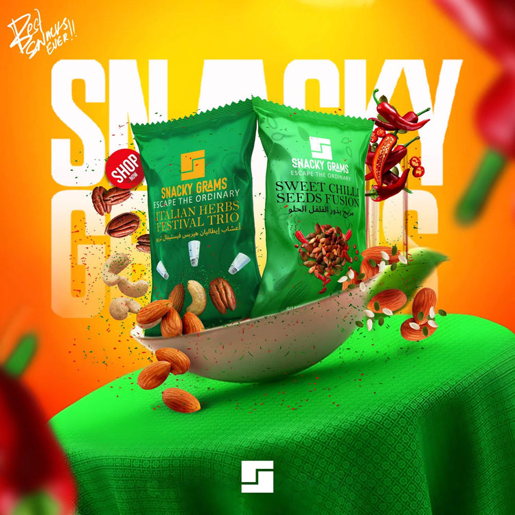 Two green snack packages with seeds and nuts on a green surface, against an orange background with 'Shacky Gran's' branding.